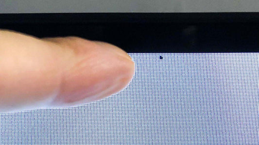 Small Black Dot on Laptop Screen? Causes, Fixes & What It Means